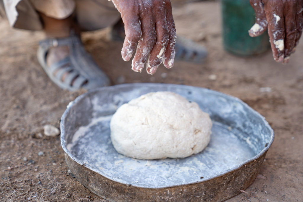 Bedouin making bread, near Dana Biosphere Reserve, Wadi Arabah, Jordan